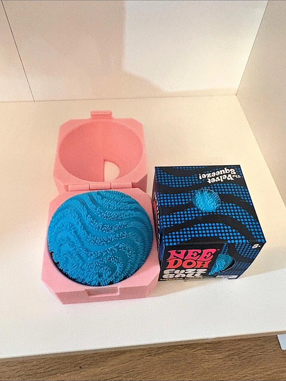 Schylling NeeDoh Fuzz Ball Wonder Waves Blue & pink case. 1 Needoh, 1 case.
